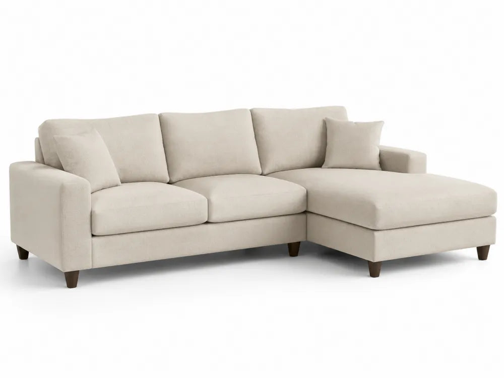 Divano angolare in tessuto beige con cuscini sfoderabili